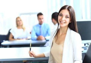 bigstock-Business-woman-with-her-team-a-48958436