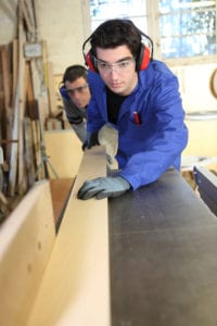 bigstock-Carpenter-and-apprentice-worki-12642488