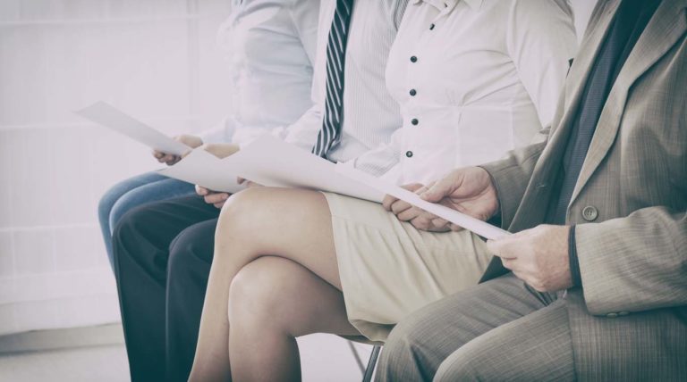 recruitment recruiting hire recruit hiring recruiter interview employment job exam room stress stressful position young group formal work chair corporation sitting diversity concept - stock image